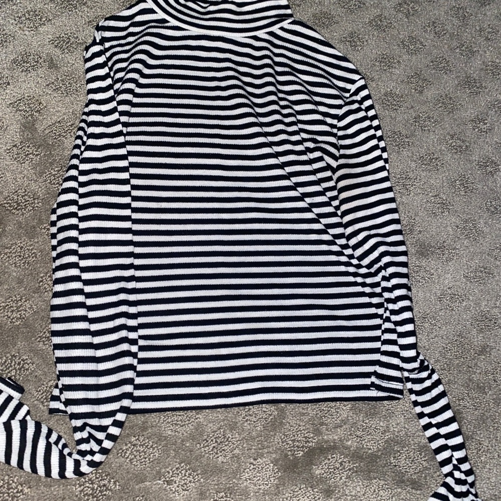 A striped turtle neck long sleeve